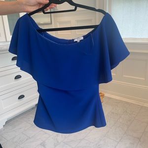 GORGEOUS off-the-shoulder Reid’s true blue top.